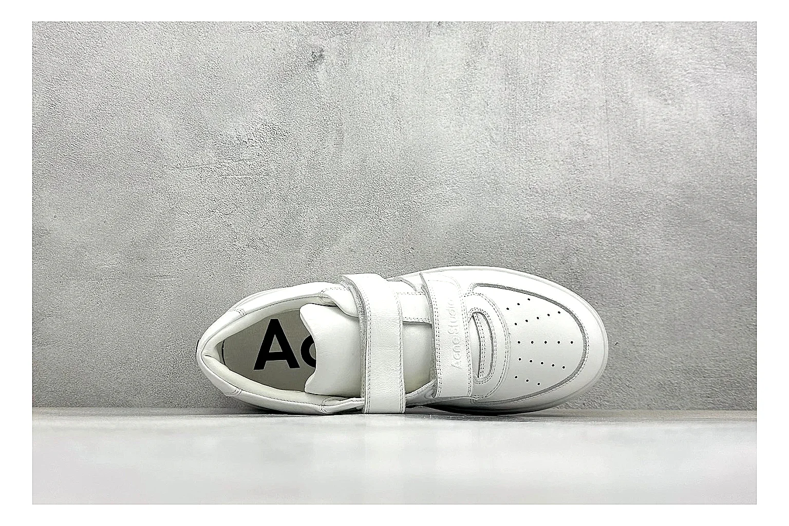 Acne Studios Velcro White Mid-Top spreadsheet record image showing white leather panels, broad hook-and-loop straps, padded mid-top collar, and a clean rubber sole thumbnail 2