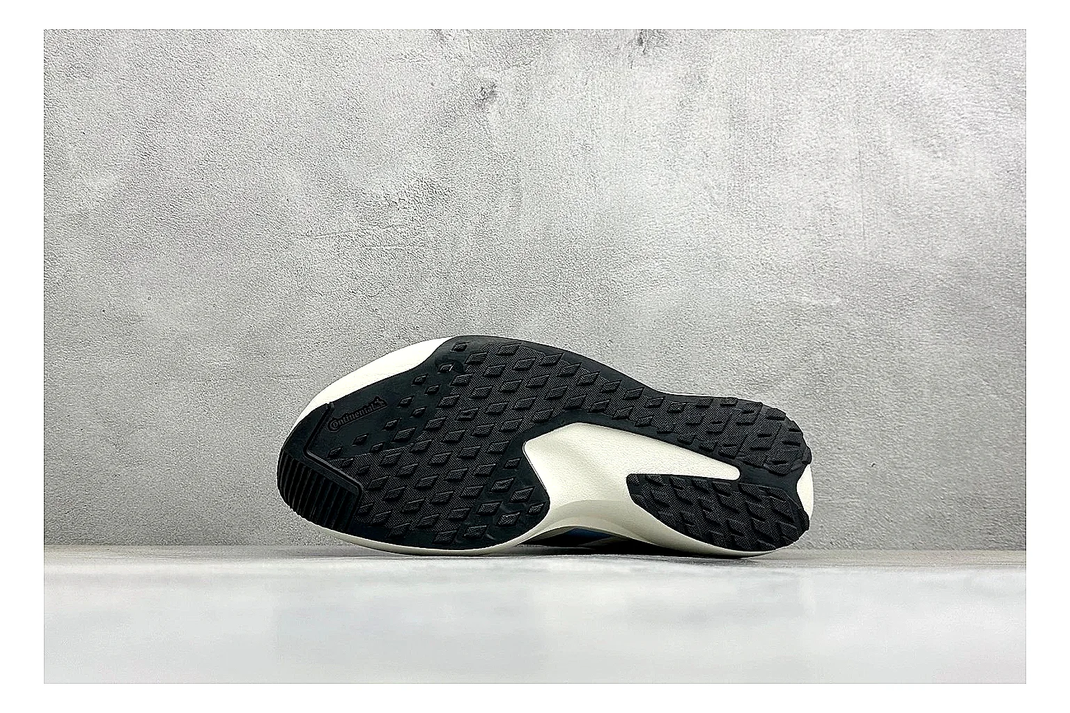 Adidas Adizero Evo Black spreadsheet record photo showing black racing upper, sculpted white sole, Adidas striping, and lightweight performance silhouette