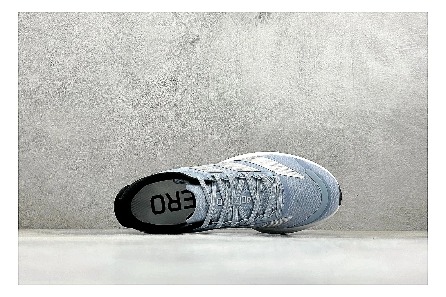 Adidas Adizero Grey Blue spreadsheet record photo showing grey lightweight runner upper, blue Adidas striping, slim racing shape, and low performance sole thumbnail 2