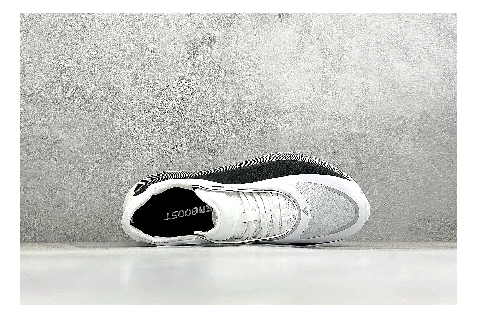 Adidas Hyper Boost White Black spreadsheet record photo showing white knit runner upper, black Adidas striping, sculpted Boost-style sole, and modern low runner profile thumbnail 2