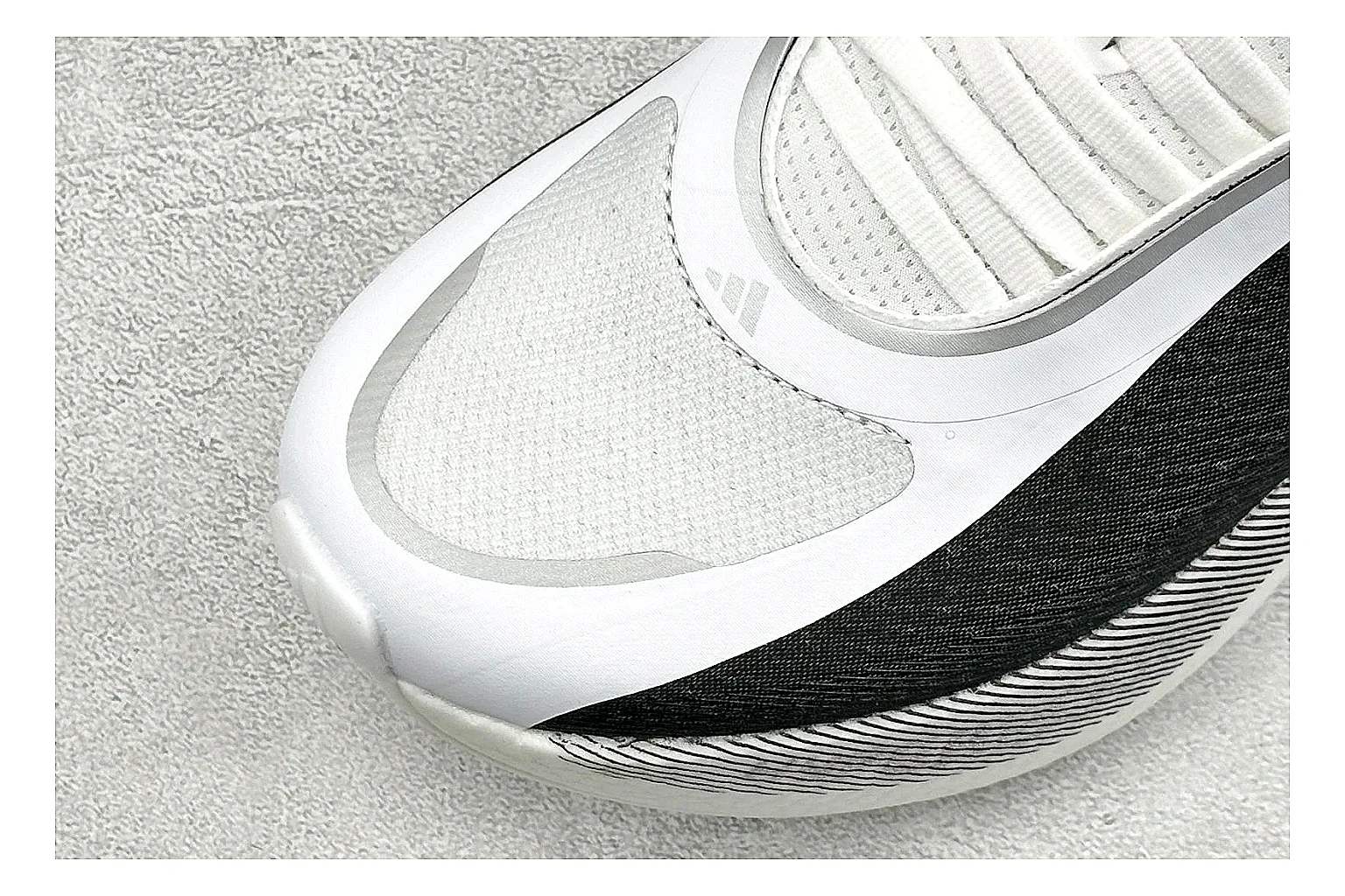 Adidas Hyper Boost White Black spreadsheet record photo showing white knit runner upper, black Adidas striping, sculpted Boost-style sole, and modern low runner profile thumbnail 5