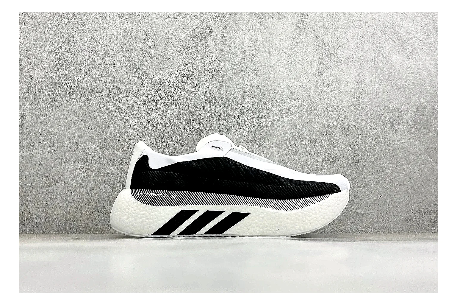 Adidas Hyper Boost White Black spreadsheet record photo showing white knit runner upper, black Adidas striping, sculpted Boost-style sole, and modern low runner profile thumbnail 6