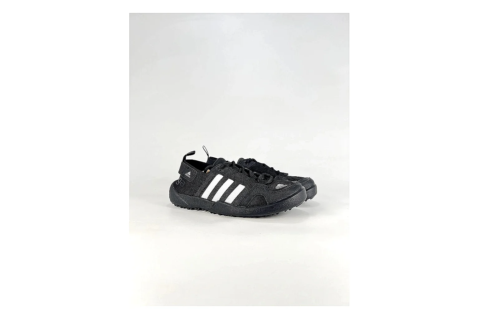 Adidas Originals Daroga Black White Sneakers spreadsheet record image with black white low-top sneakers with mesh texture, side-profile shape, upper panel lines, and outsole detail thumbnail 6