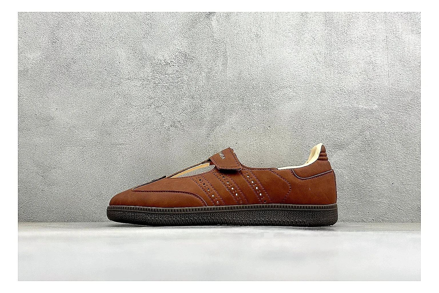 Adidas Samba Jane Brown spreadsheet record photo showing brown Mary Jane upper, Samba-style side stripes, strap closure, gum outsole, and low terrace profile
