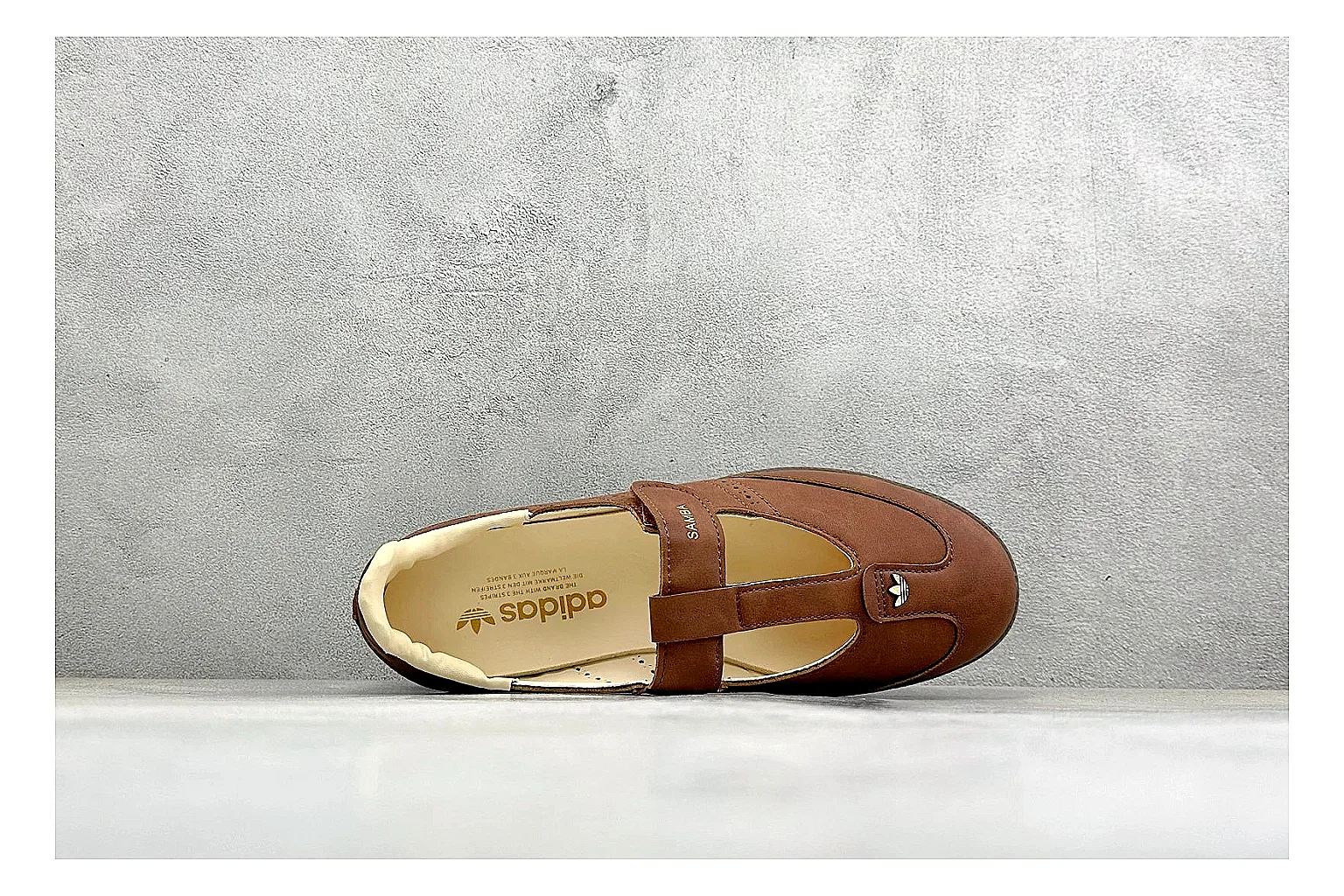 Adidas Samba Jane Brown spreadsheet record photo showing brown Mary Jane upper, Samba-style side stripes, strap closure, gum outsole, and low terrace profile thumbnail 2