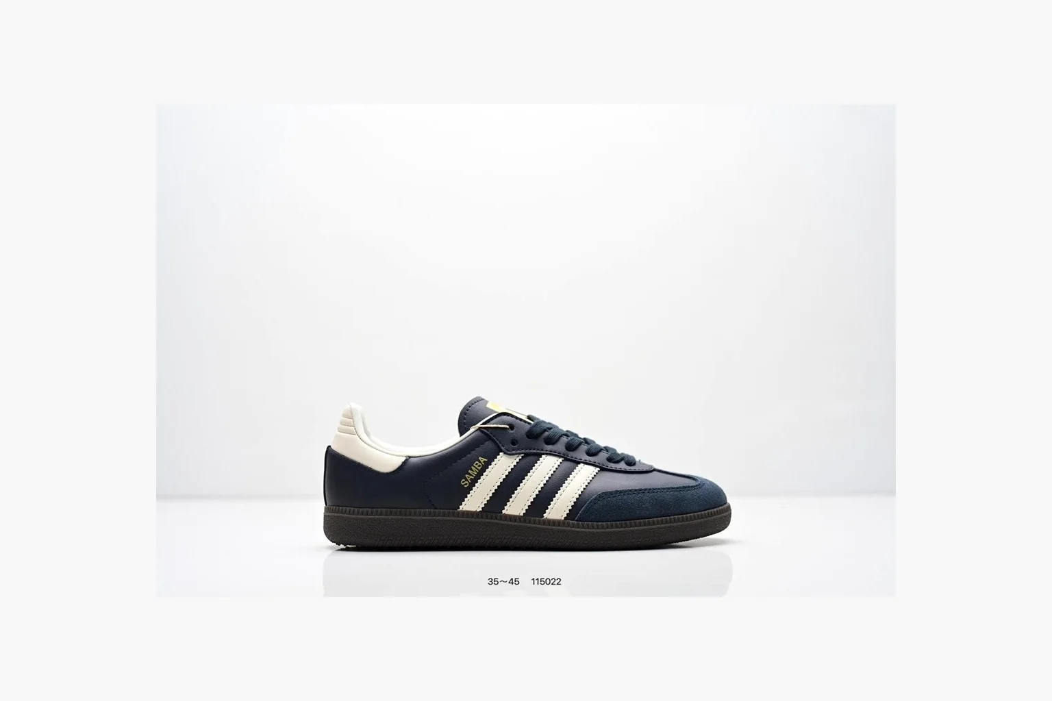 Adidas Samba OG Black White Gold spreadsheet record photo showing black leather-suede low-top upper, white three stripes, gold tongue label, gum sole, and classic Samba side profile