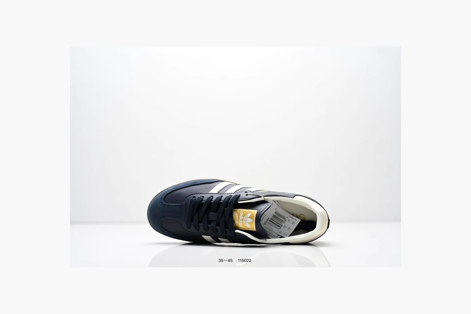 Adidas Samba OG Black White Gold spreadsheet record photo showing black leather-suede low-top upper, white three stripes, gold tongue label, gum sole, and classic Samba side profile thumbnail 2