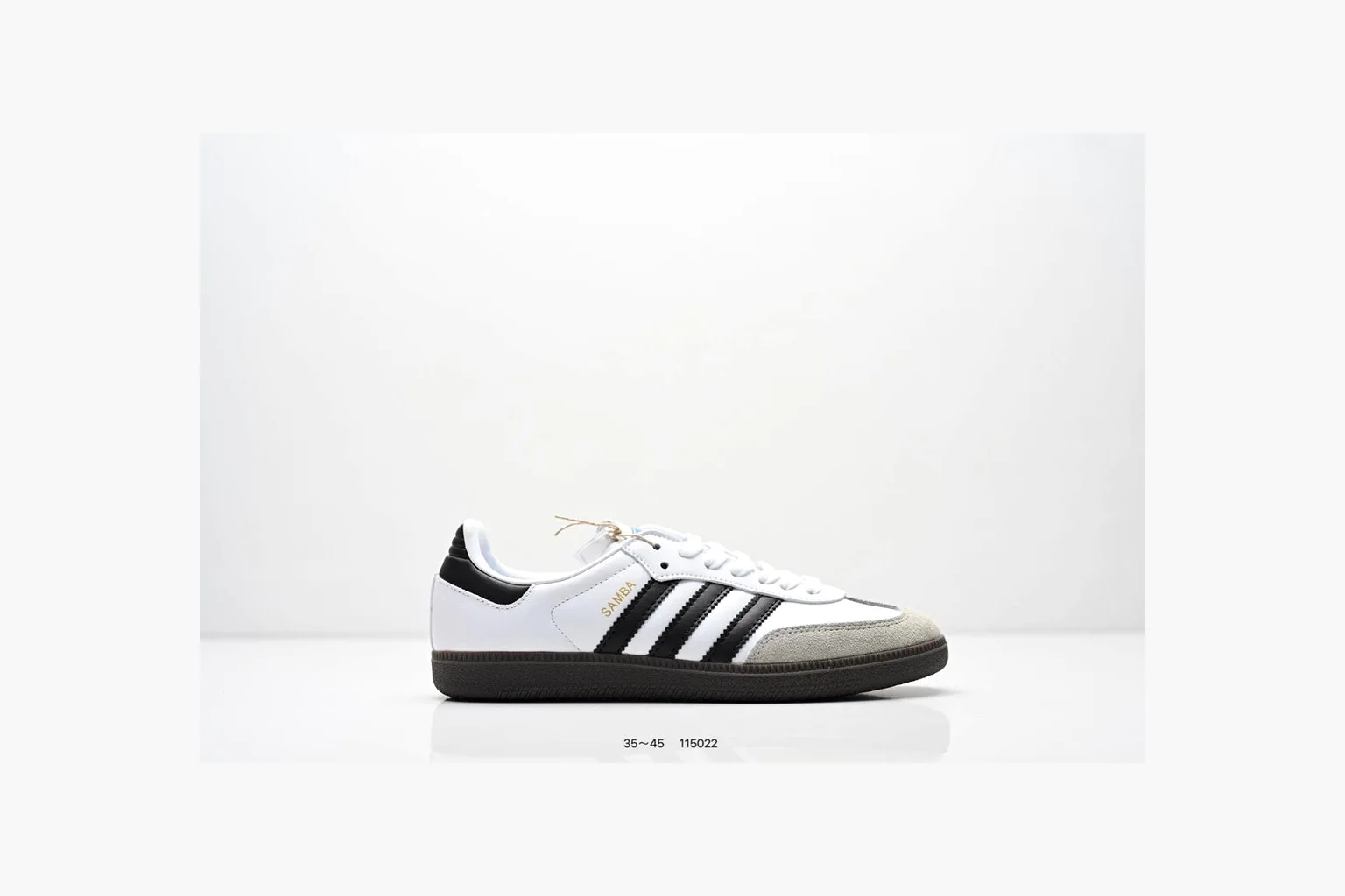 Adidas Samba OG White Black Blue spreadsheet record photo showing white leather-suede low-top upper, black three stripes, blue heel detail, gum terrace sole, and slim Samba profile