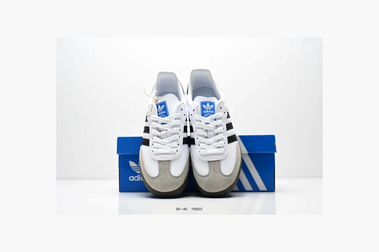 Adidas Samba OG White Black Blue spreadsheet record photo showing white leather-suede low-top upper, black three stripes, blue heel detail, gum terrace sole, and slim Samba profile thumbnail 5