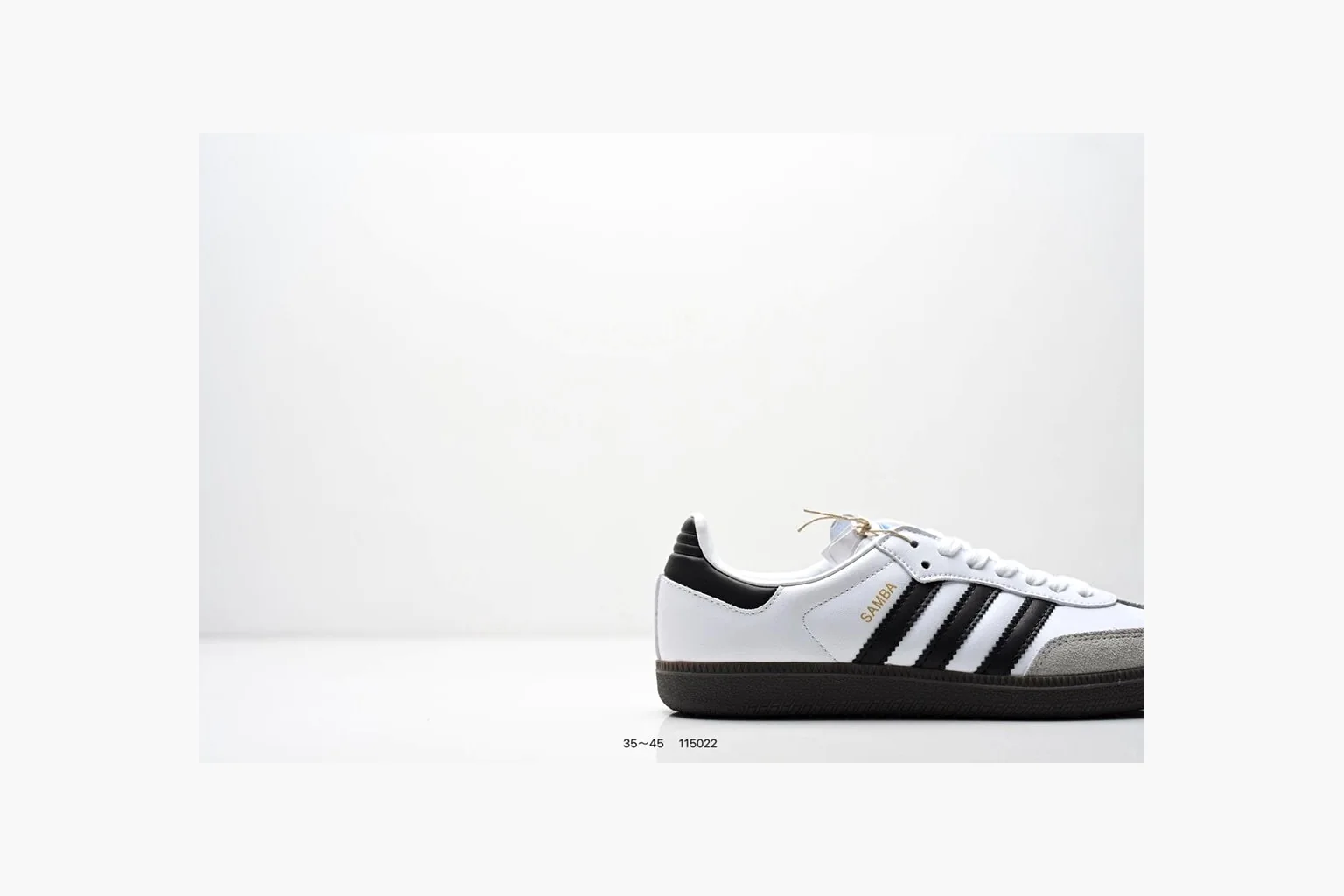 Adidas Samba OG White Black Blue spreadsheet record photo showing white leather-suede low-top upper, black three stripes, blue heel detail, gum terrace sole, and slim Samba profile thumbnail 6