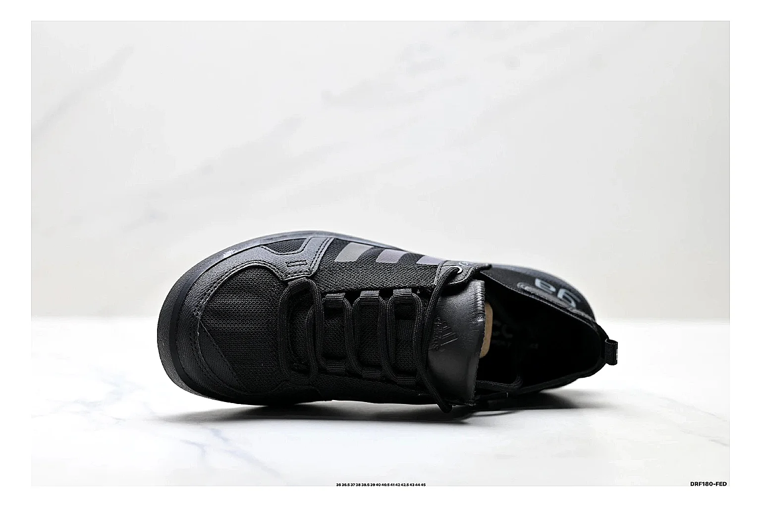 Adidas Terrex Daroga Black Sneakers spreadsheet record image with black outdoor trail sneakers with mesh texture, side-profile shape, upper panel lines, and outsole detail thumbnail 2
