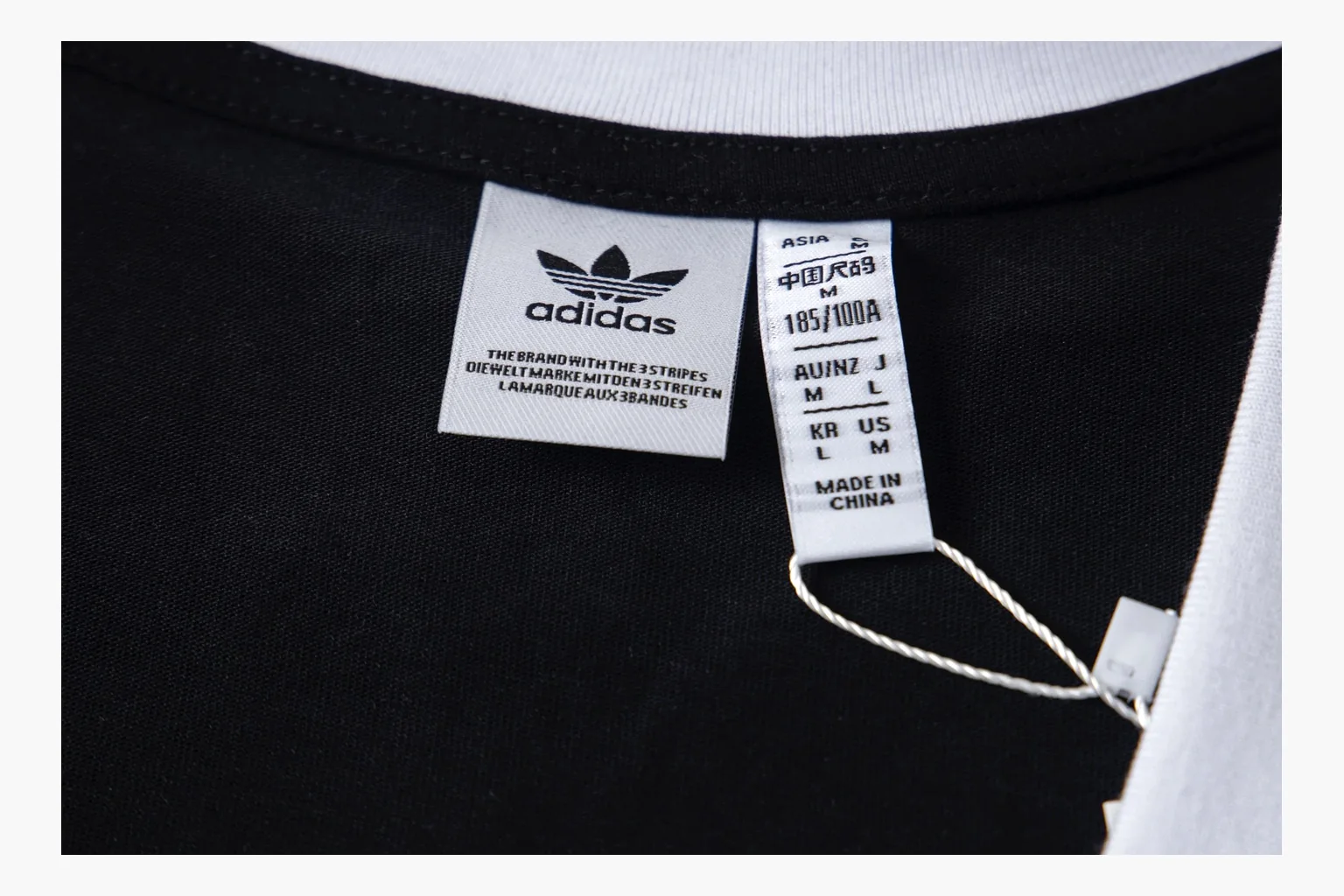 Adidas black V-neck ringer tee spreadsheet record image thumbnail 5