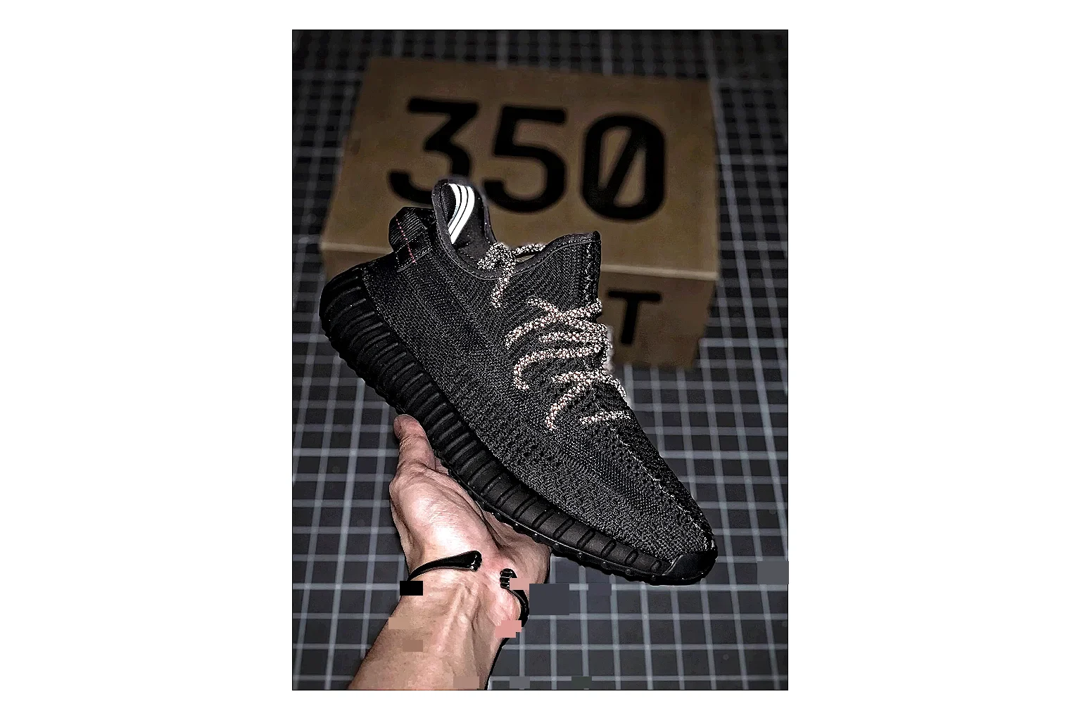 Adidas Yeezy 350 Boost Black Sheetbase record image with black yeezy 350 knit runner with knit upper and knit shape