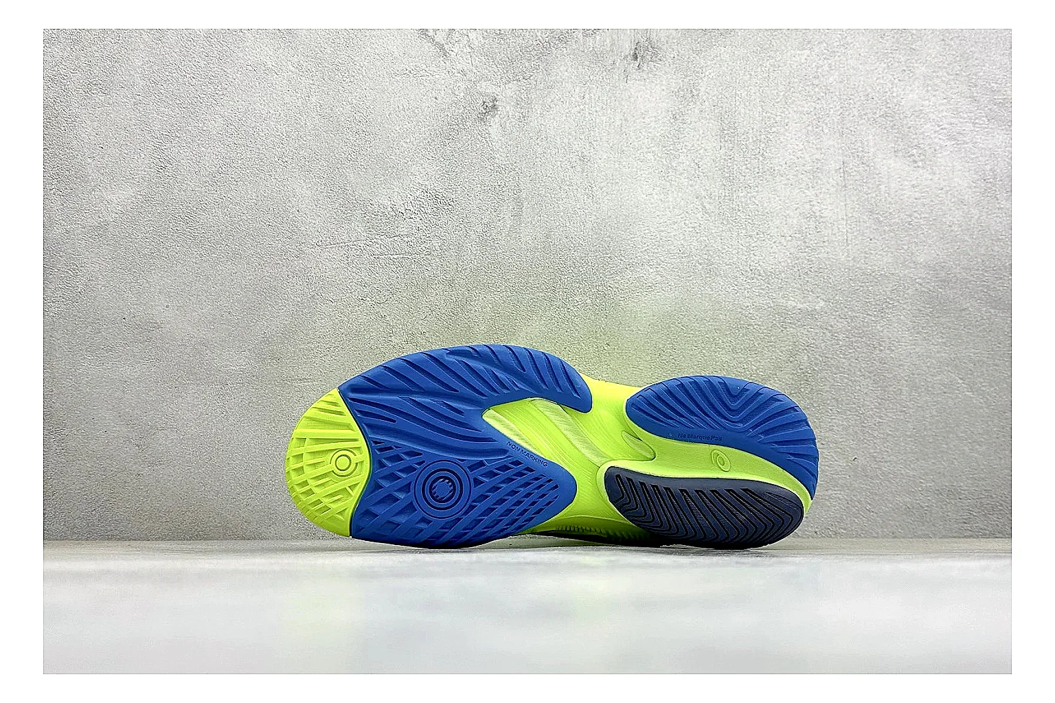 Asics Court FF Volt Blue spreadsheet record photo showing bright volt and blue court upper, supportive sole wall, Asics side lines, and stable tennis profile