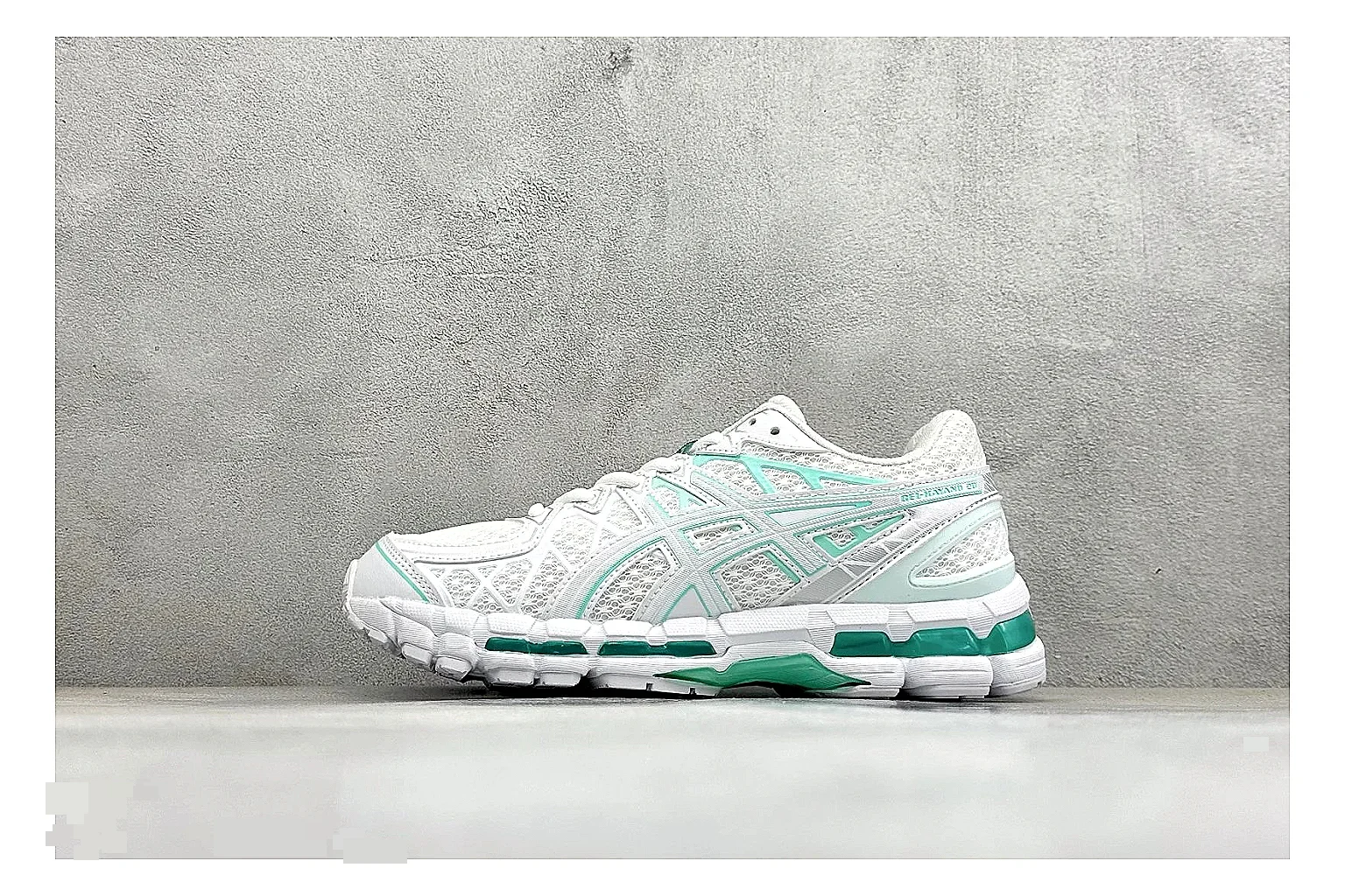 Asics Gel-Kayano White Mint spreadsheet record photo showing white mesh runner upper, mint Asics accents, cushioned Gel-Kayano sole, and technical support shape