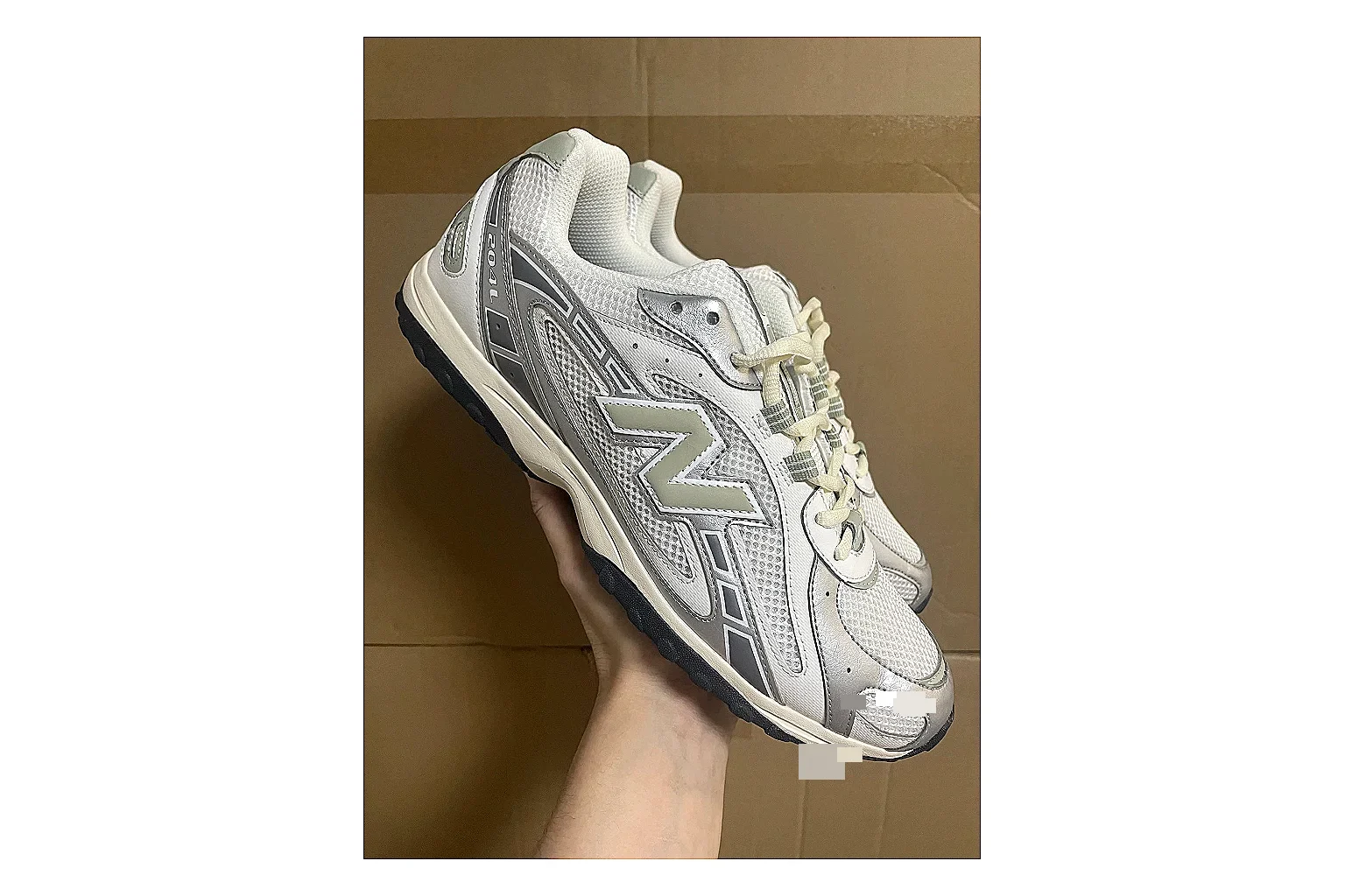 Asics Gel Kayano White Silver spreadsheet record photo showing white mesh-leather runner upper, silver overlays, supportive Kayano shape, and cushioned retro sole