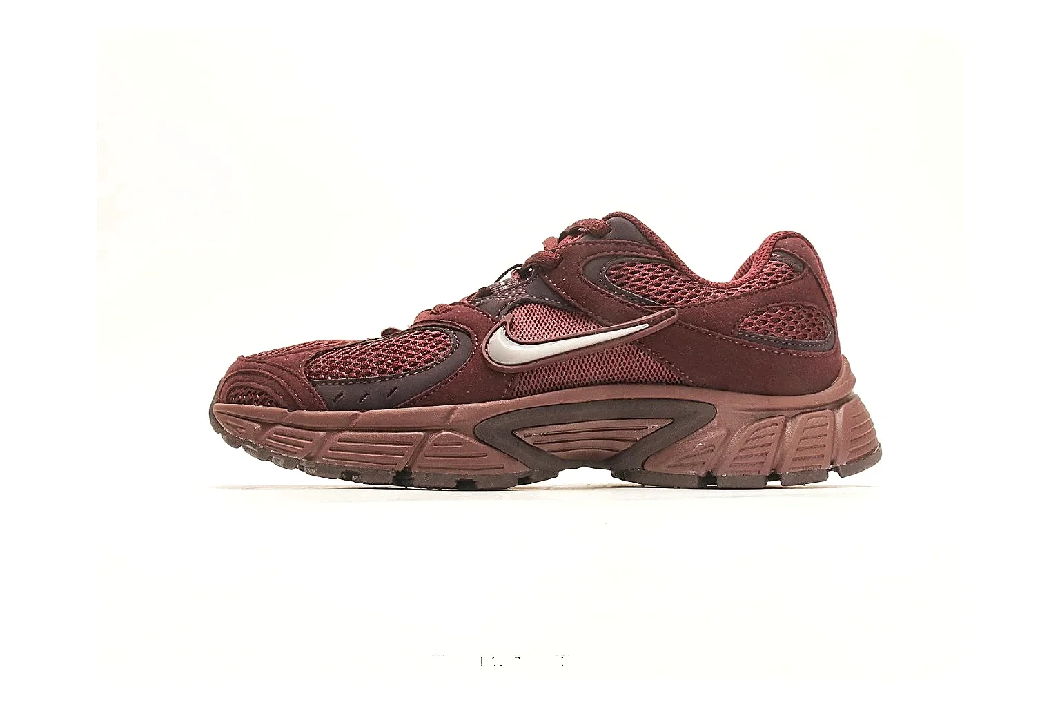 Asics Gel Runner Brown spreadsheet record photo showing brown mesh-leather runner upper, layered Asics panels, retro running shape, and cushioned sole