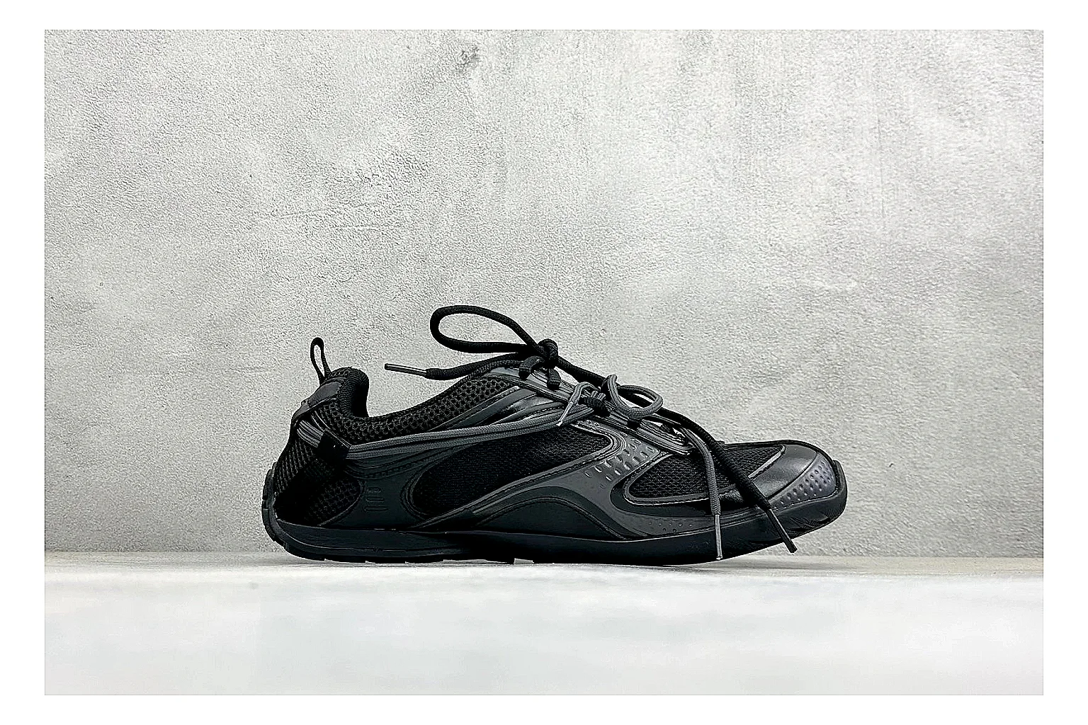 Balenciaga Track Black Low-Top spreadsheet record photo showing black layered technical upper, complex paneling, chunky runner sole, and tactical low-top shape thumbnail 6