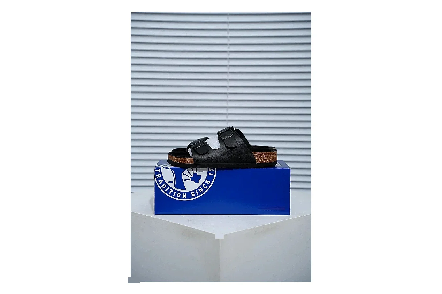 Birkenstock Arizona Black Cork Slide Sheetbase record image with adjustable buckles, contoured footbed and dark outsole for versatile casual looks
