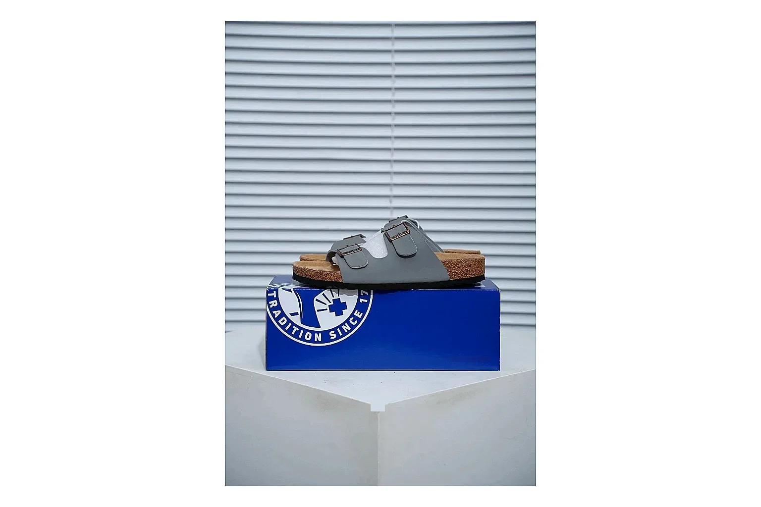 Birkenstock Arizona Charcoal Cork Slide Sheetbase record image with adjustable buckles, molded cork footbed and dark outsole for understated everyday style