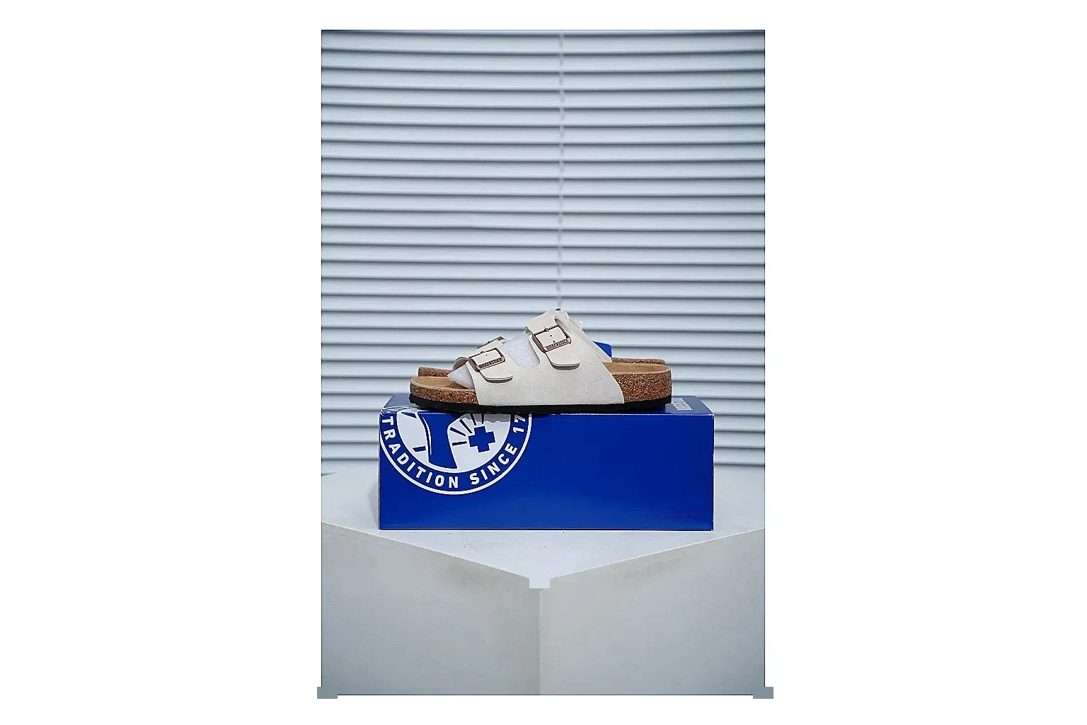 Birkenstock Arizona Cream Cork Slide Sheetbase record image with adjustable buckles, soft neutral upper and contoured footbed for easy casual wear