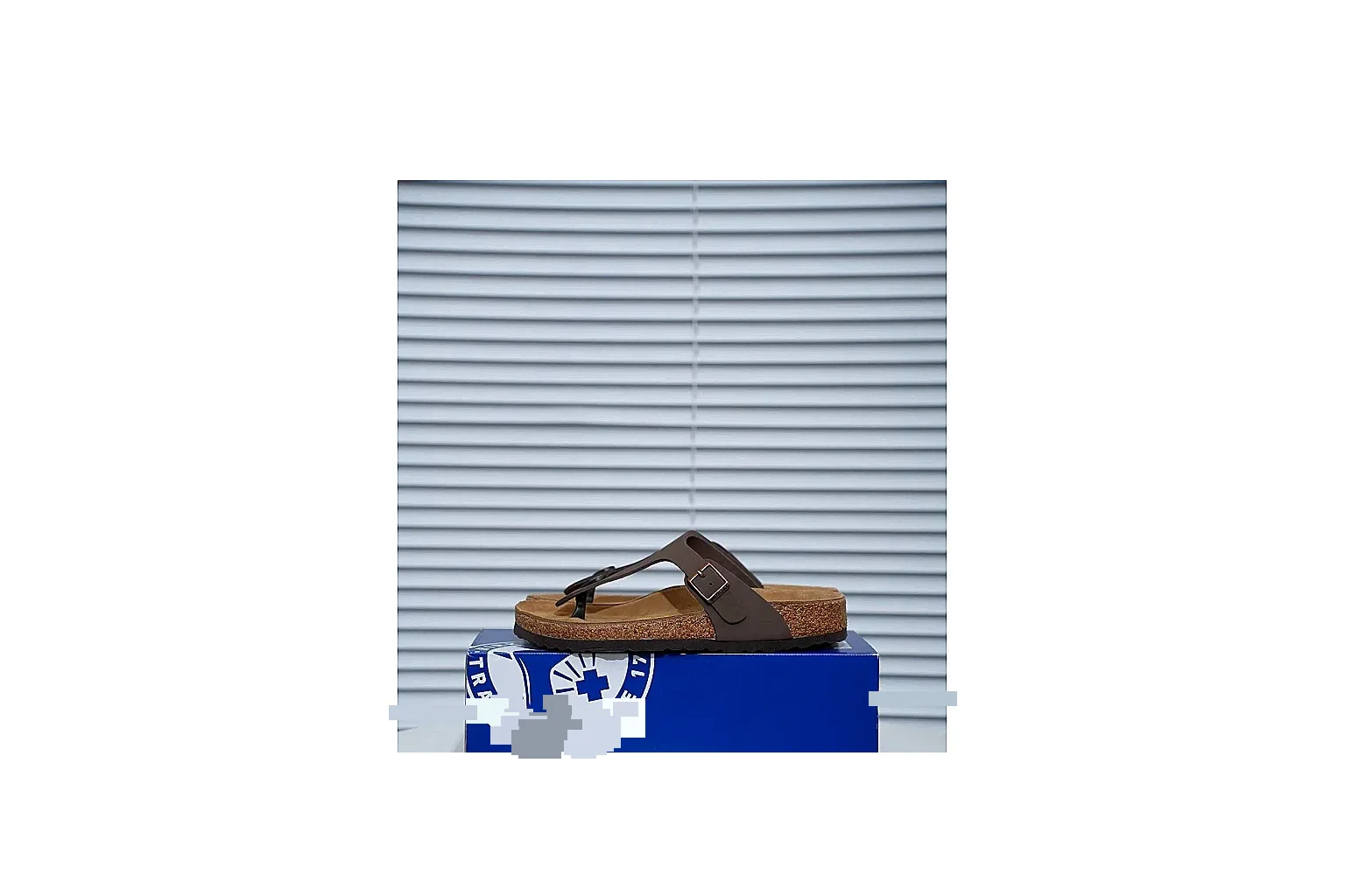 Birkenstock Brown Buckle Cork Slide Sheetbase record image with wide strap, large metal buckle and contoured footbed for classic relaxed styling