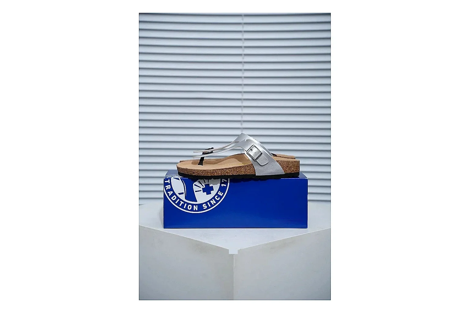 Birkenstock Cream Buckle Cork Slide Sheetbase record image with wide strap, large metal buckle and contoured footbed for simple summer comfort