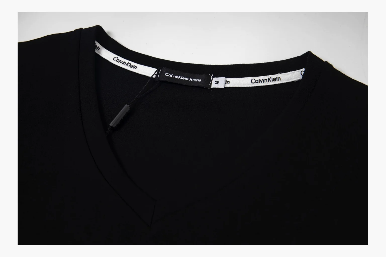 Calvin Klein black V-neck tee spreadsheet record image thumbnail 4