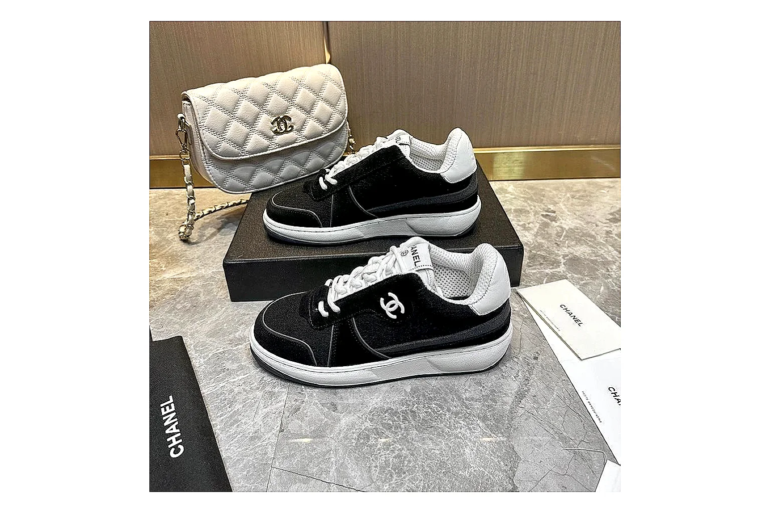 Kako Sheetbase record image for Chanel Black Runner Sneaker