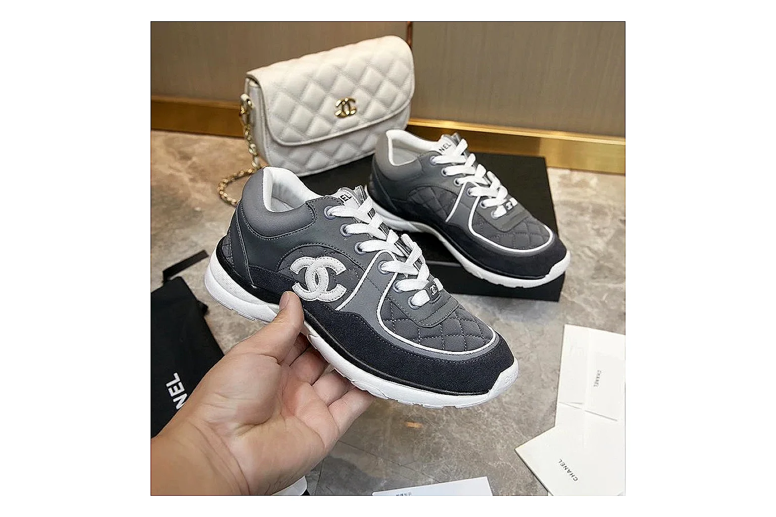 Kako Sheetbase record image for Chanel Black Runner Sneaker