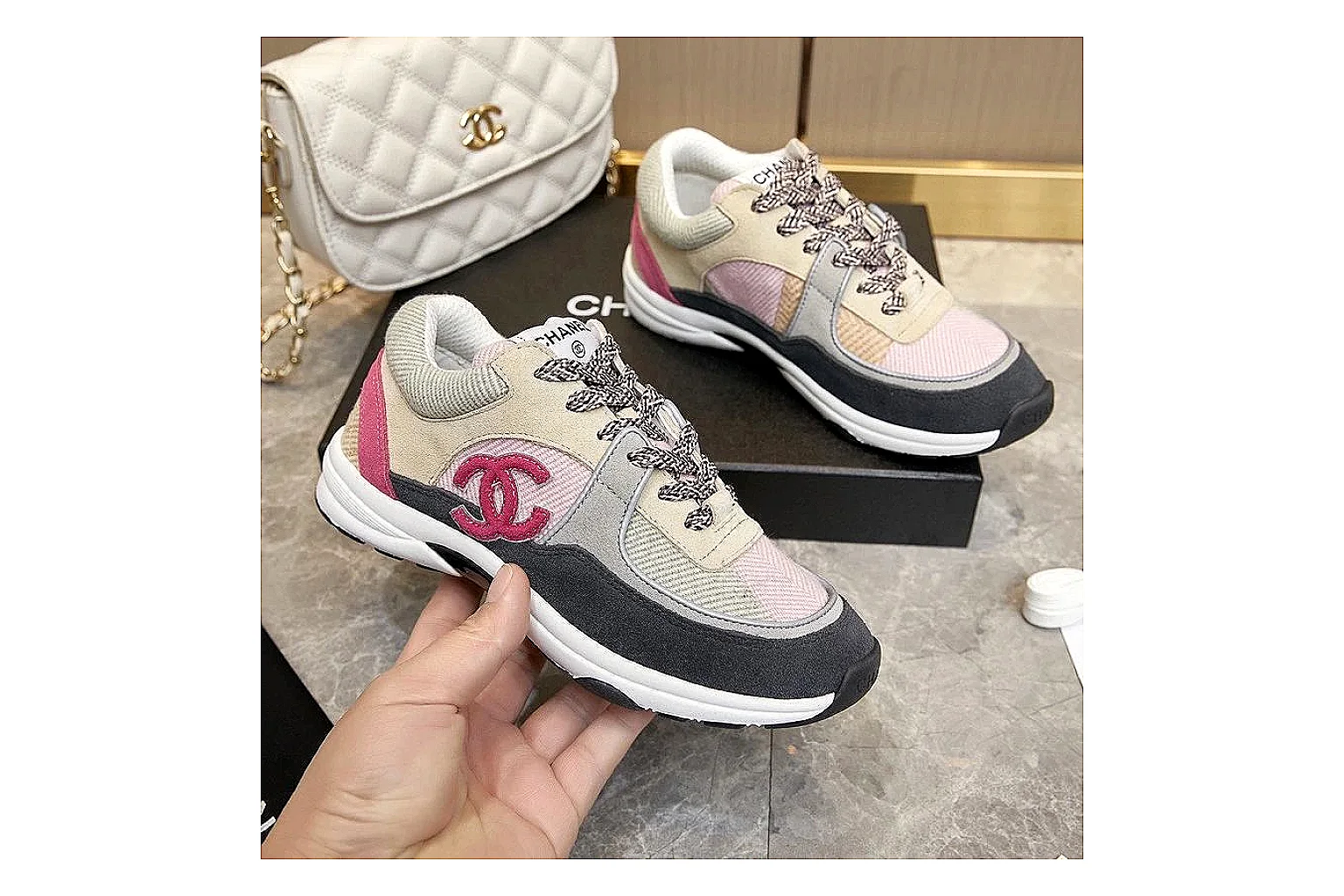 Kako Sheetbase record image for Chanel Black Runner Sneaker
