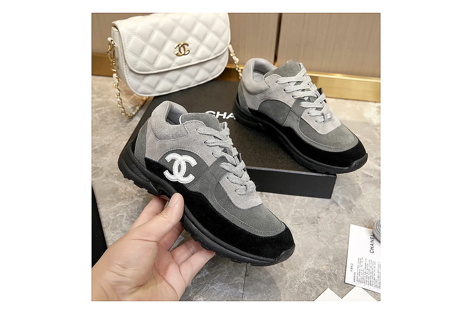 Kako Sheetbase record image for Chanel Black Runner Sneaker