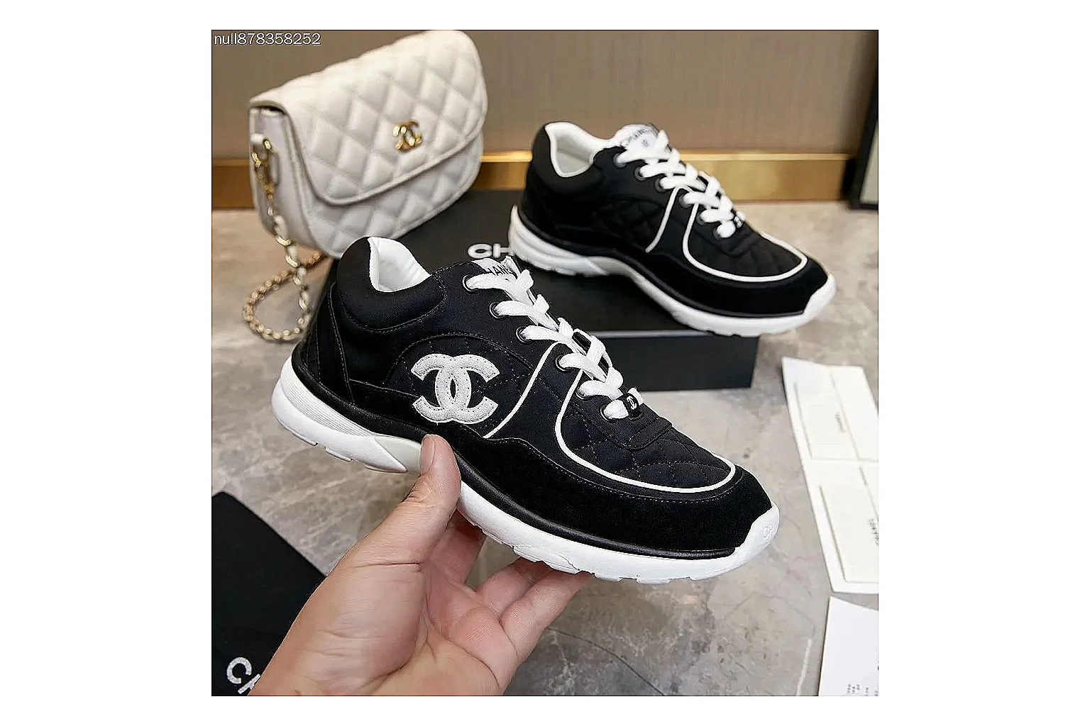 Kako Sheetbase record image for Chanel Black Runner Sneaker