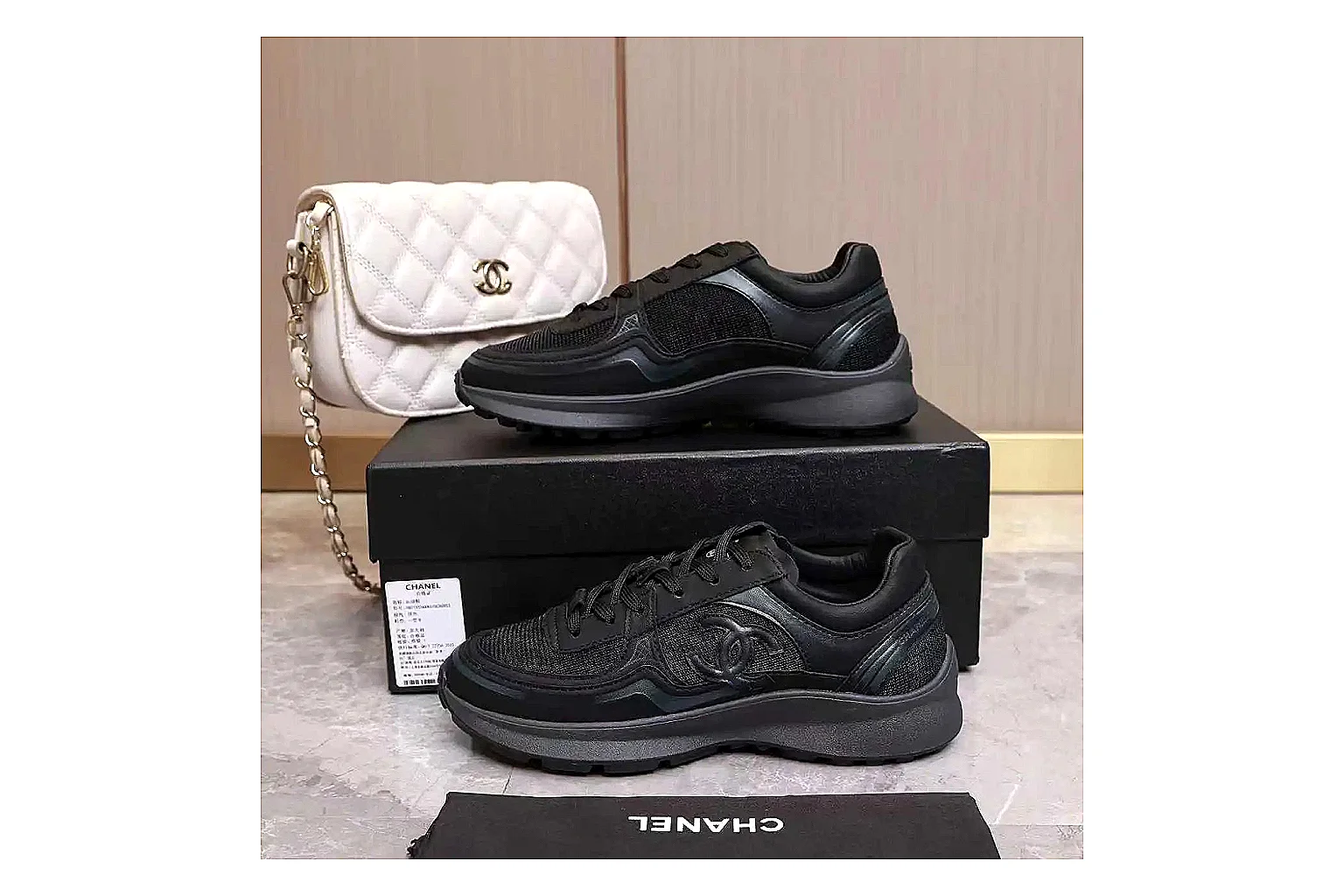 Kako Sheetbase record image for Chanel Black Runner Sneaker