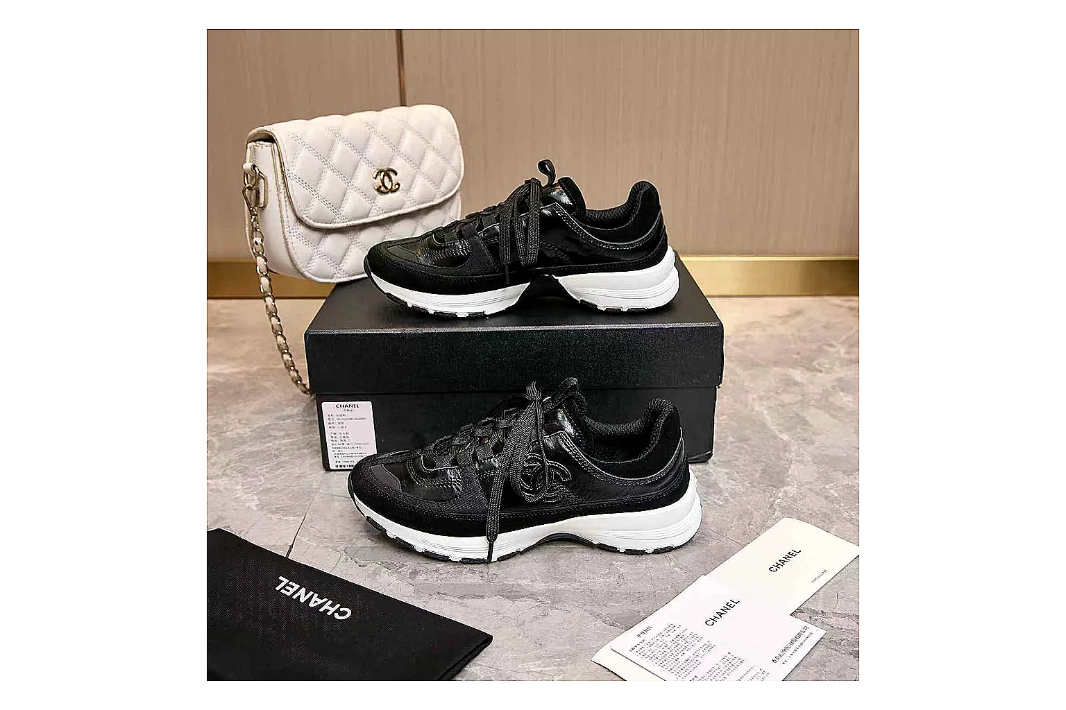 Kako Sheetbase record image for Chanel Black Runner Sneaker