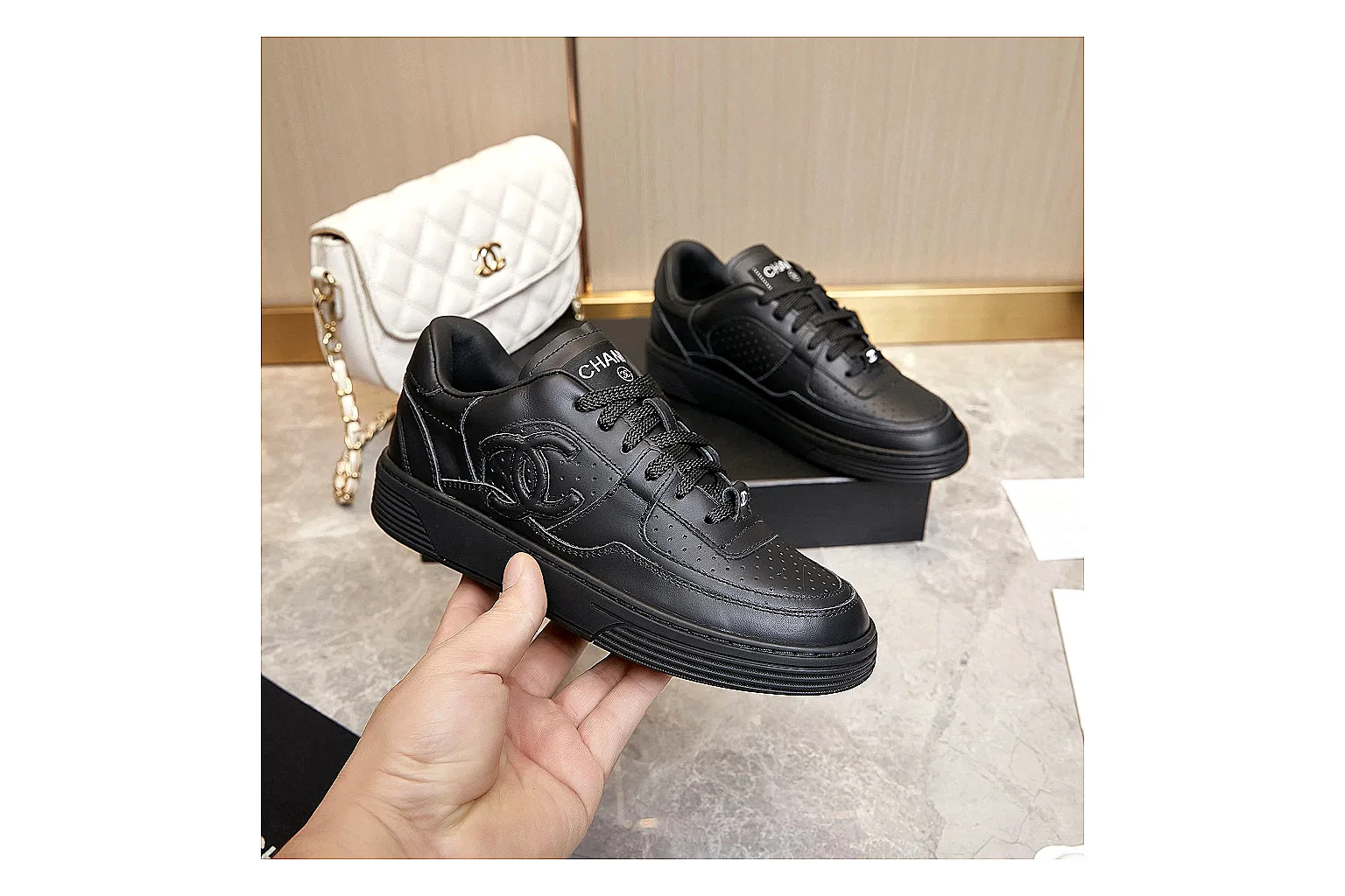 Kako Sheetbase record image for Chanel Black Runner Sneaker