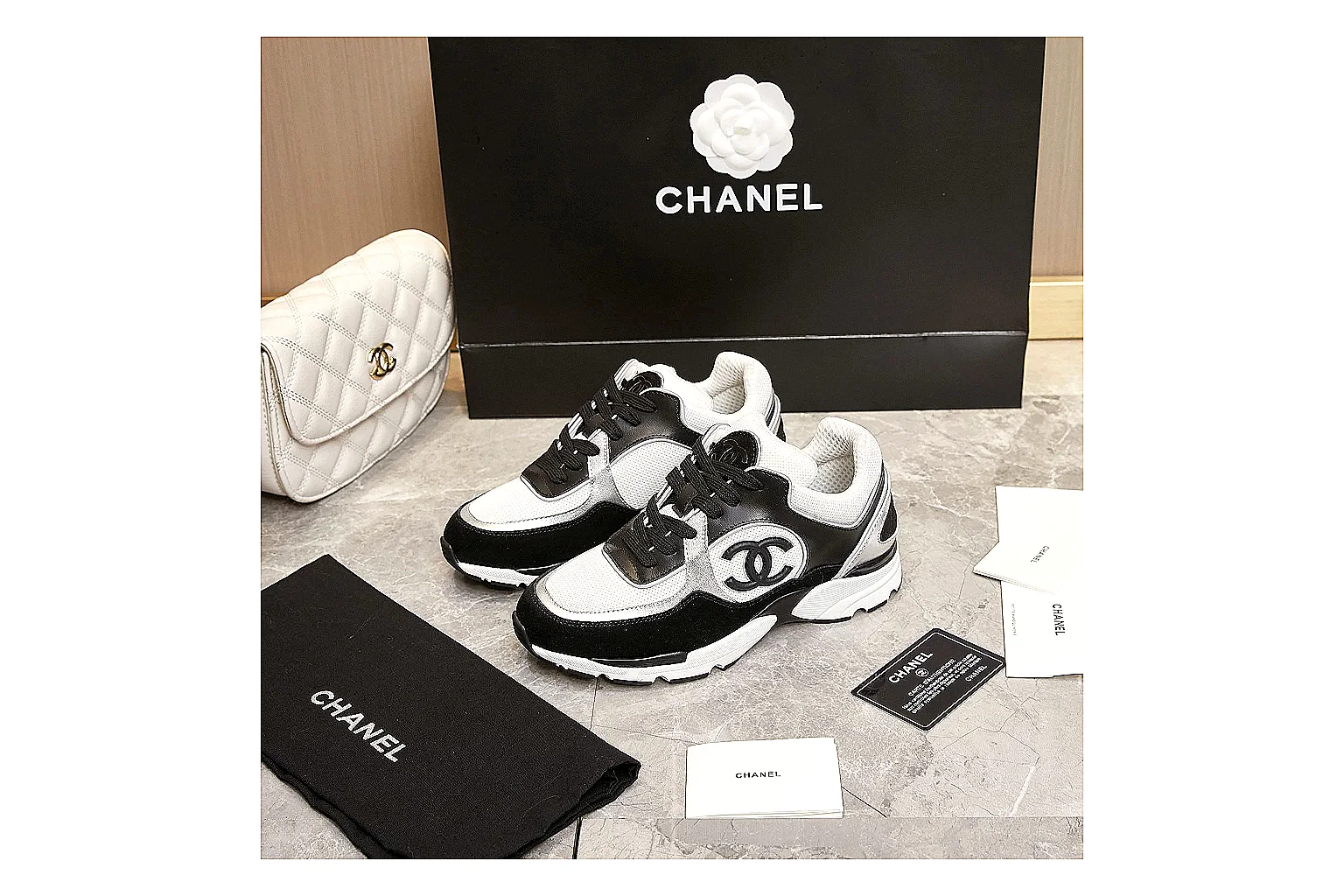 Kako Sheetbase record image for Chanel Black White Runner Sneaker thumbnail 3