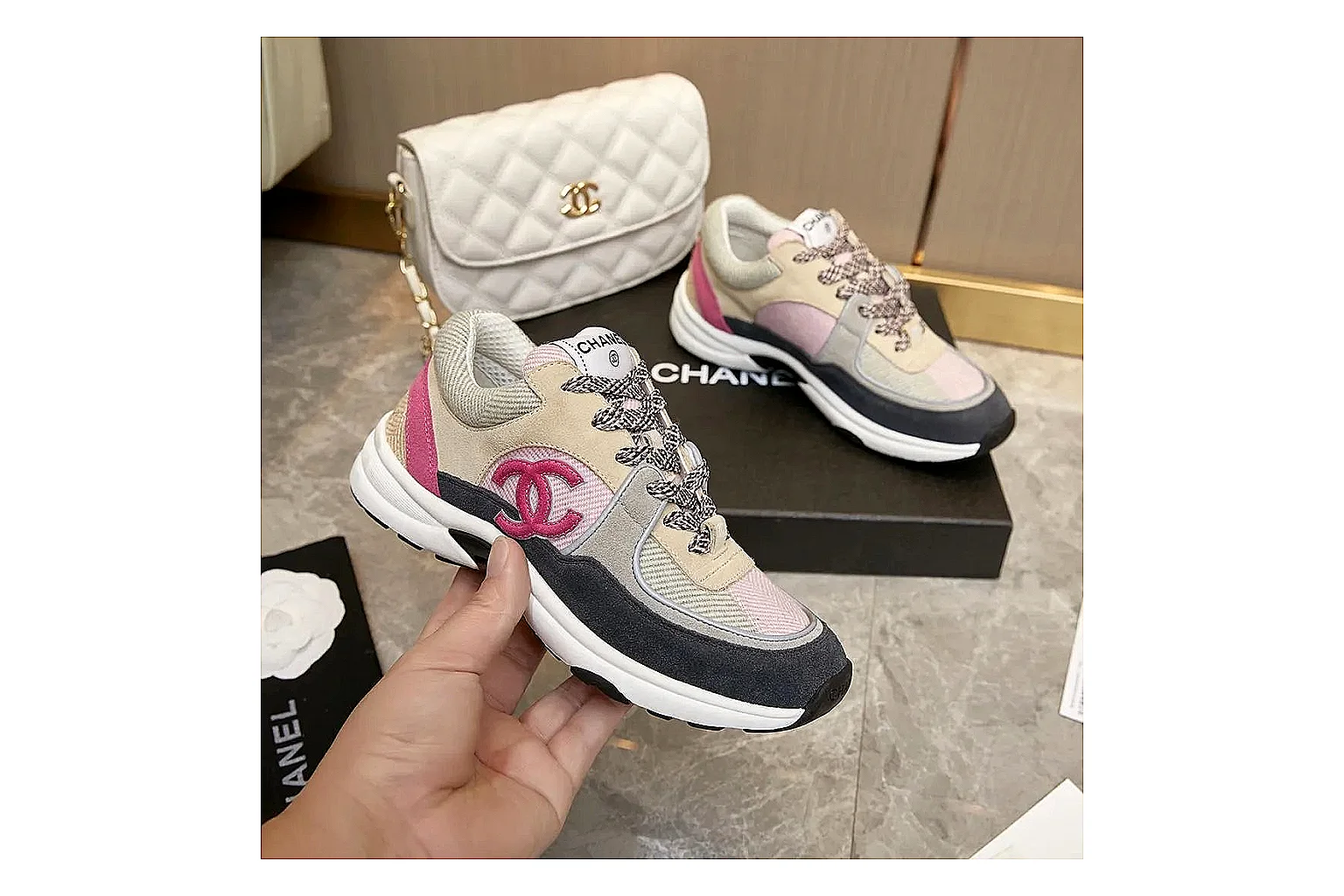 Kako Sheetbase record image for Chanel Black White Runner Sneaker