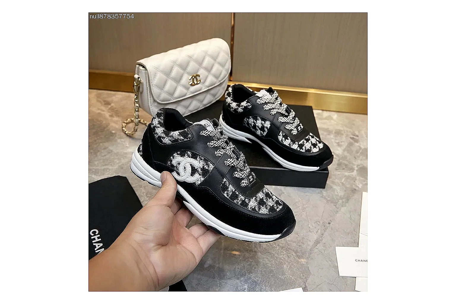 Kako Sheetbase record image for Chanel Black White Runner Sneaker