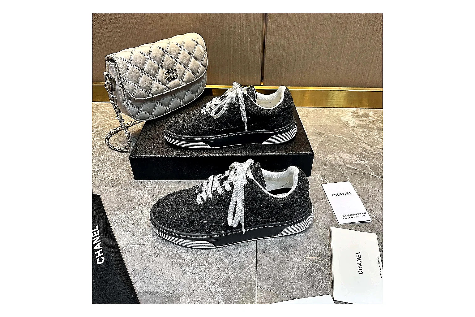Kako Sheetbase record image for Chanel Black White Runner Sneaker