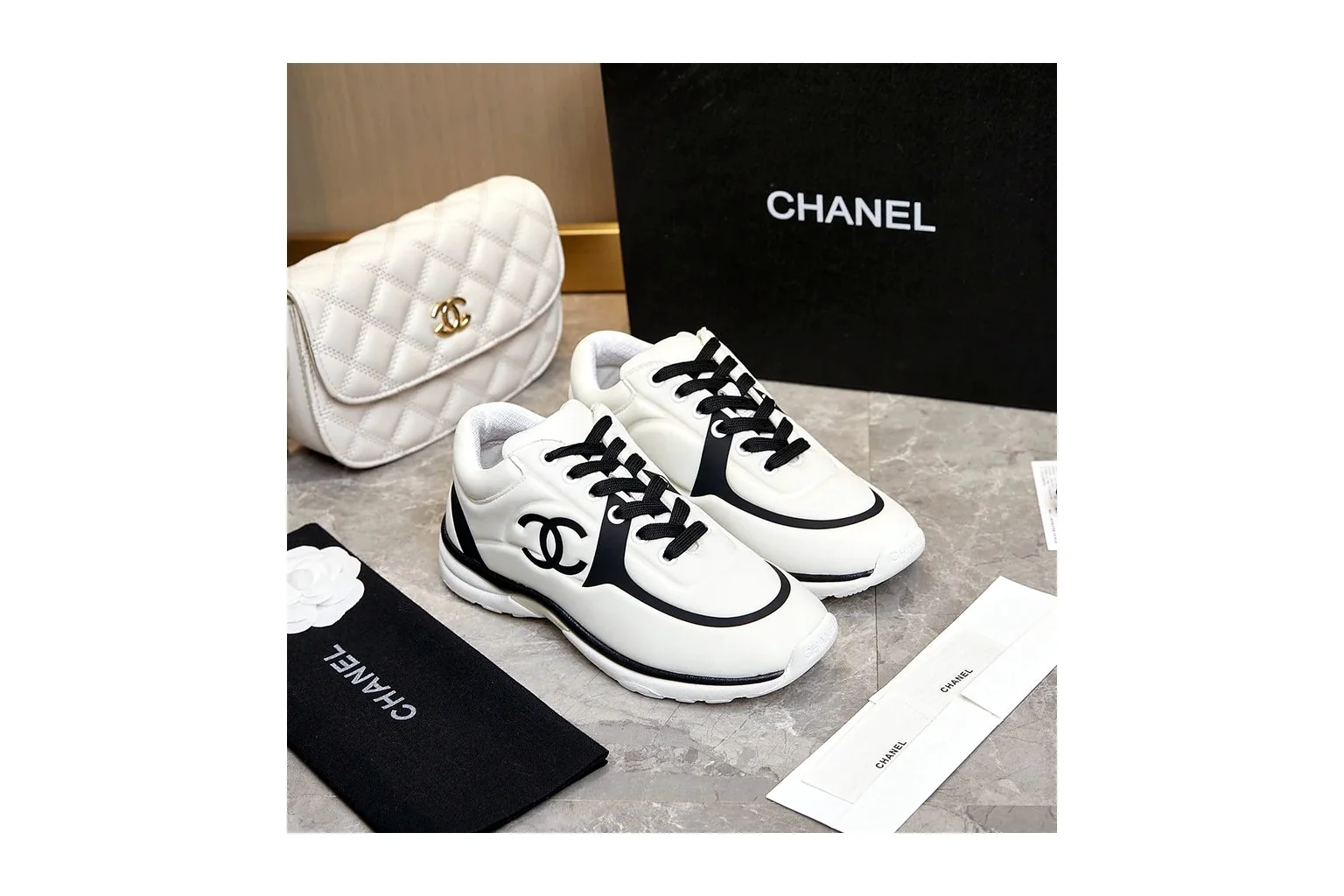 Chanel CC Low Top White Black luxury low top six photo view thumbnail 6
