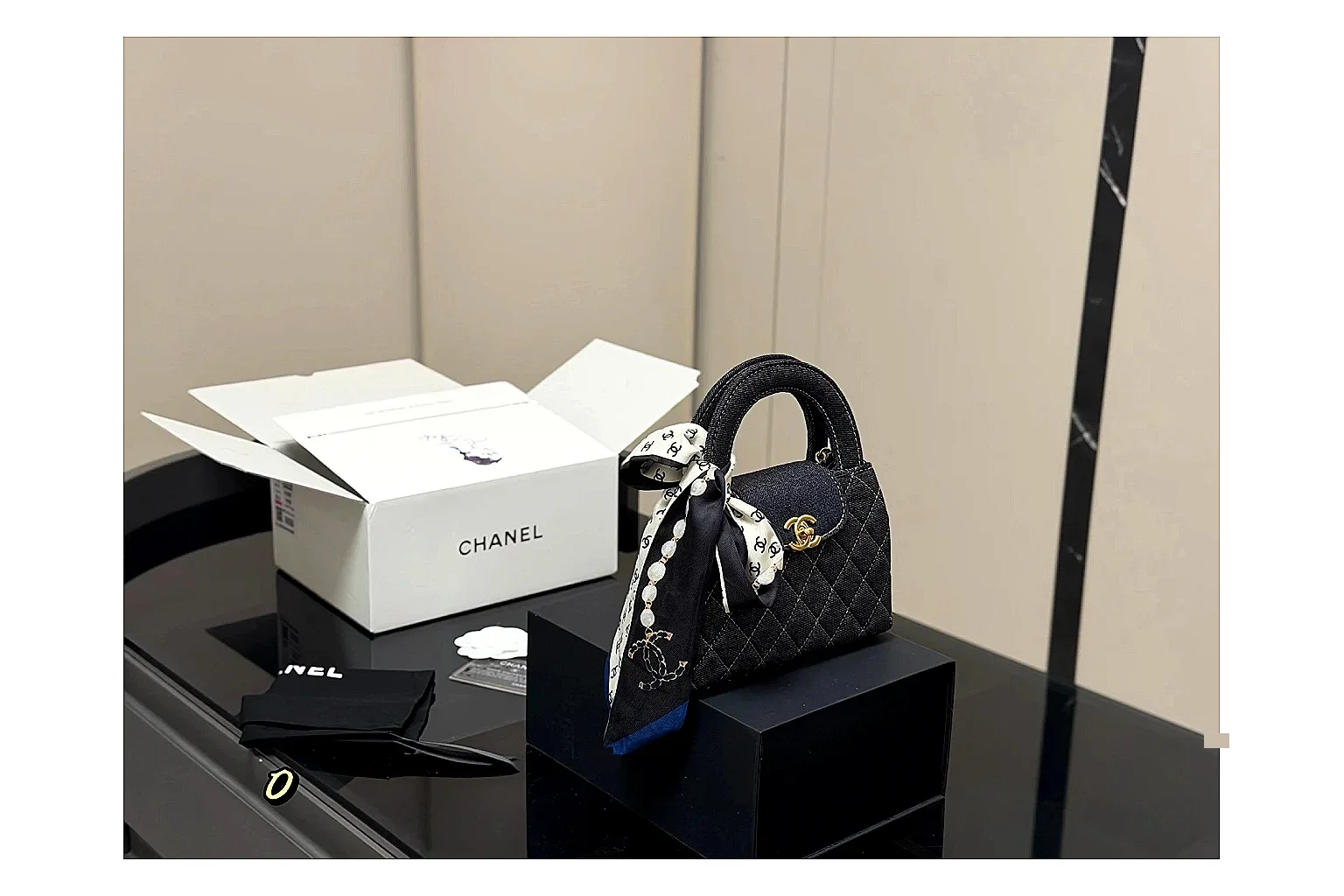 Chanel Quilted Chain Bag Black spreadsheet record photo showing black quilted leather body, chain strap, flap profile, and polished luxury hardware