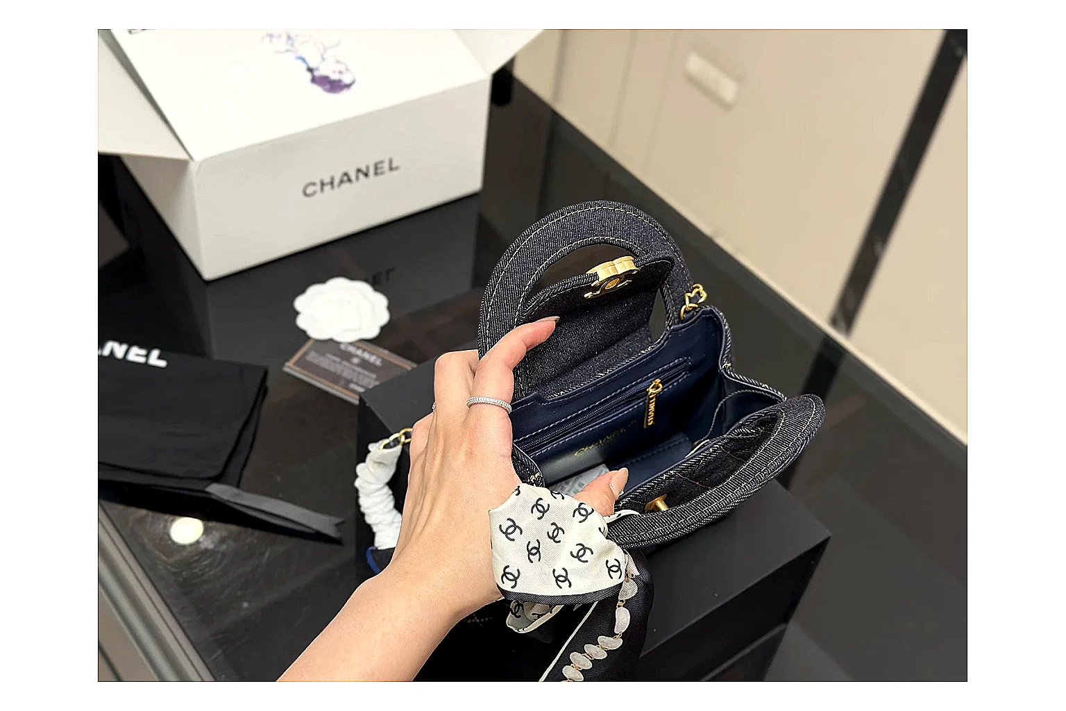 Chanel Quilted Chain Bag Black spreadsheet record photo showing black quilted leather body, chain strap, flap profile, and polished luxury hardware