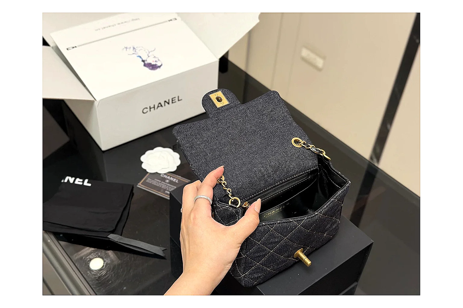 Chanel Quilted Chain Bag Black spreadsheet record photo showing black quilted leather body, chain shoulder strap, flap structure, and polished hardware