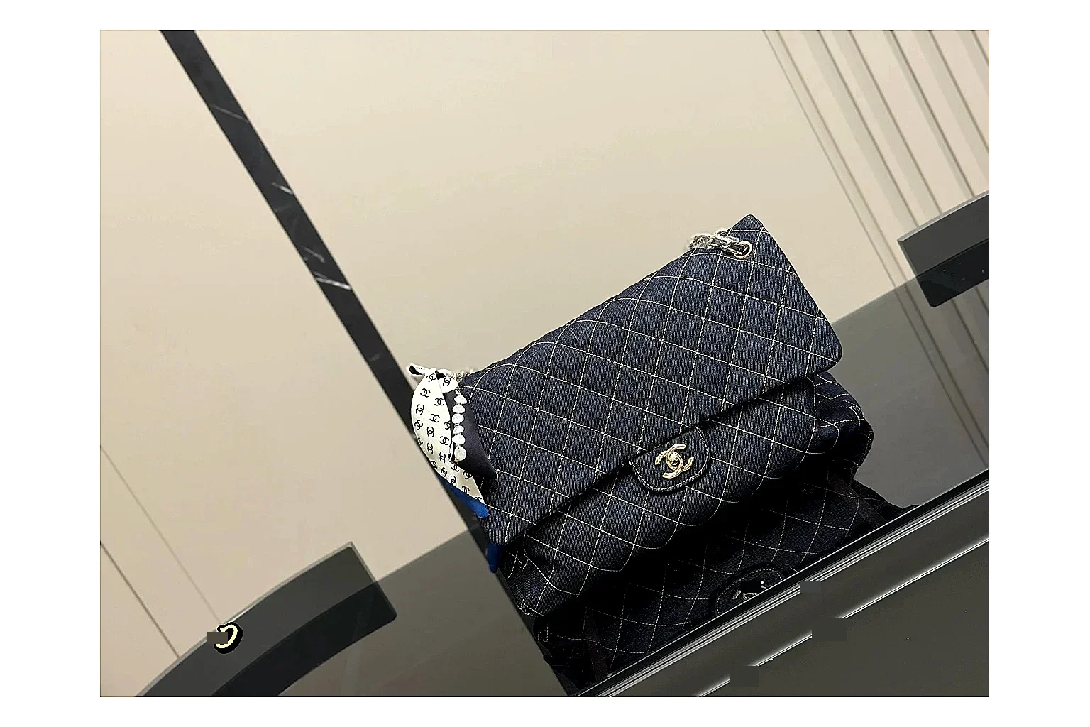 Chanel Quilted Flap Bag Black Denim spreadsheet record photo showing black denim-look quilted flap body, shoulder-bag shape, chain strap, and polished hardware