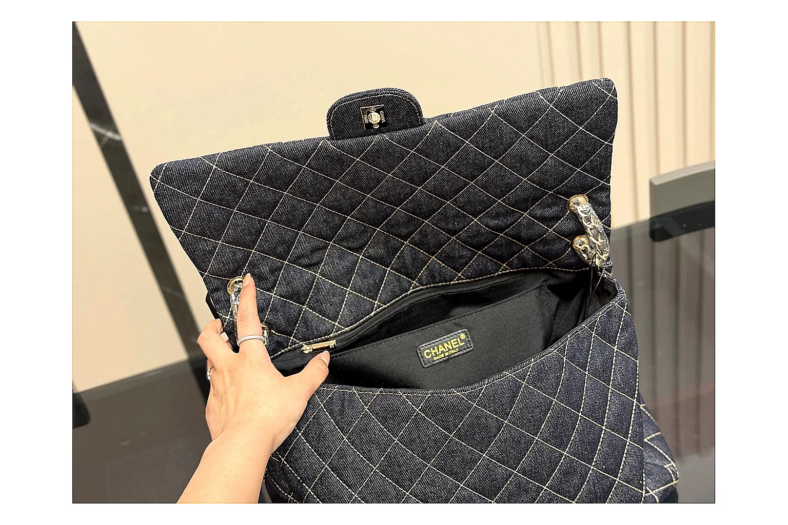 Chanel Quilted Flap Bag Black Denim spreadsheet record photo showing black denim-look quilted flap body, shoulder-bag shape, chain strap, and polished hardware