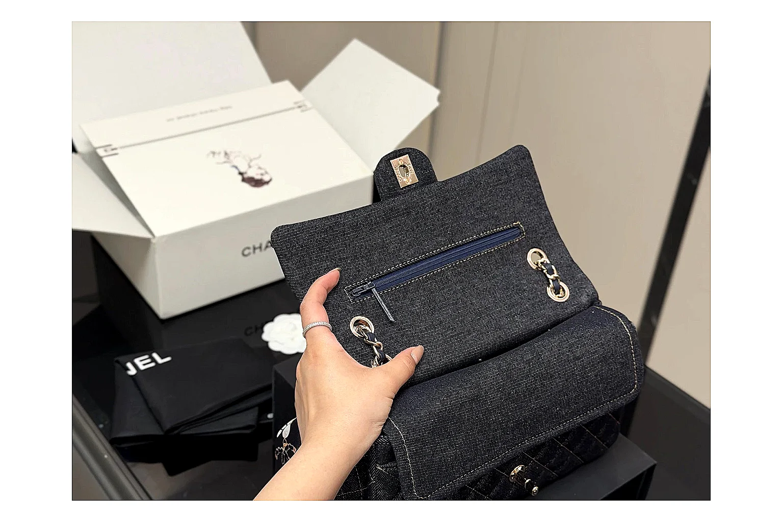 Chanel Quilted Flap Bag Black Navy spreadsheet record photo showing black navy quilted leather body, flap structure, chain strap, and polished luxury hardware thumbnail 2