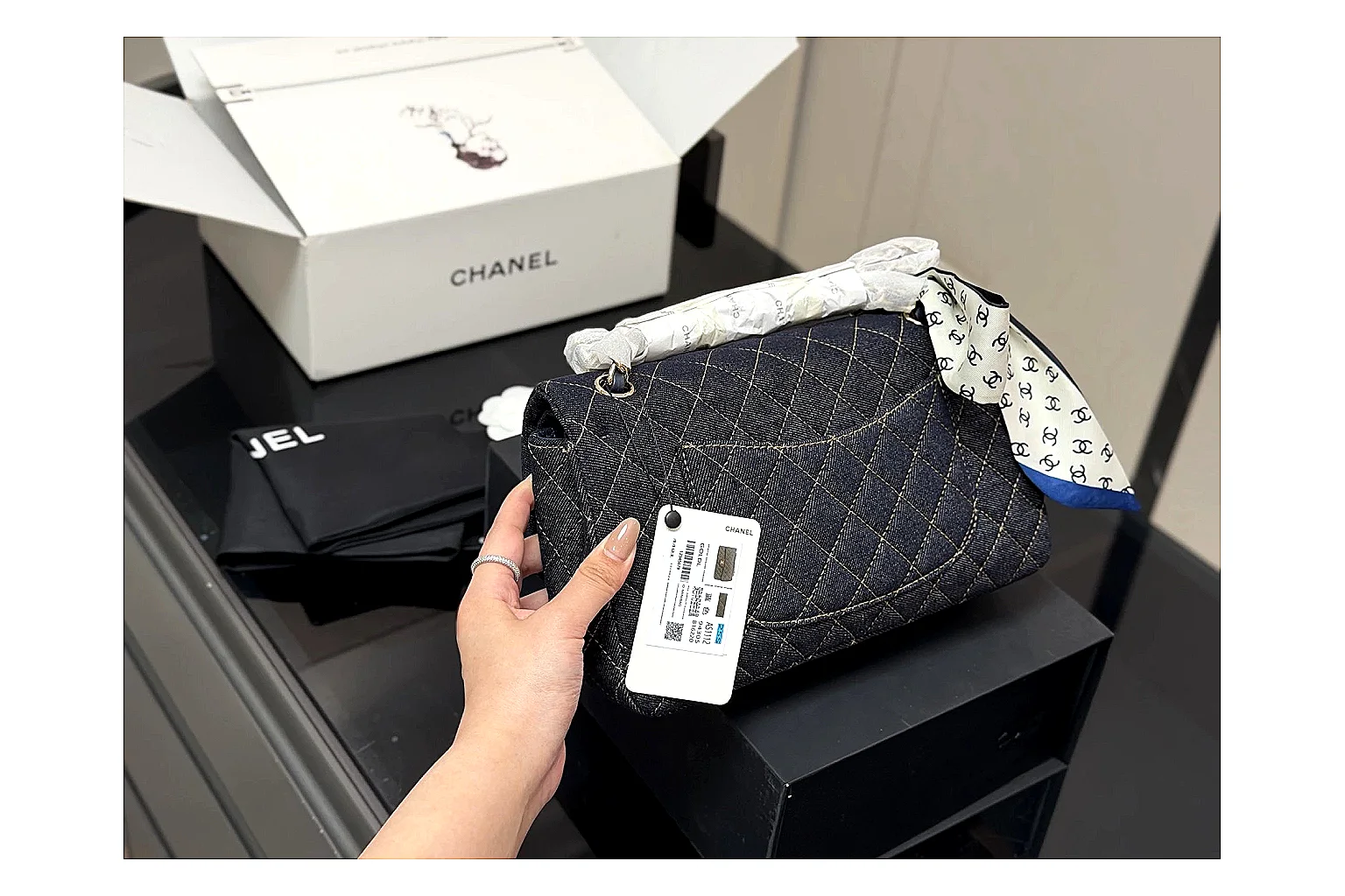 Chanel Quilted Flap Bag Black Navy spreadsheet record photo showing black navy quilted leather body, flap structure, chain strap, and polished luxury hardware thumbnail 3