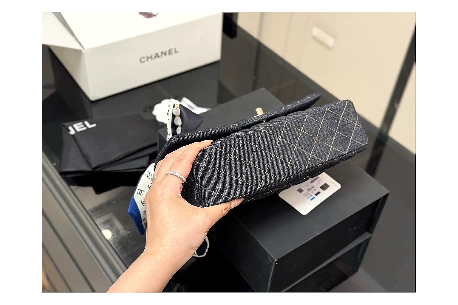 Chanel Quilted Flap Bag Black Navy spreadsheet record photo showing black navy quilted leather body, flap structure, chain strap, and polished luxury hardware thumbnail 5
