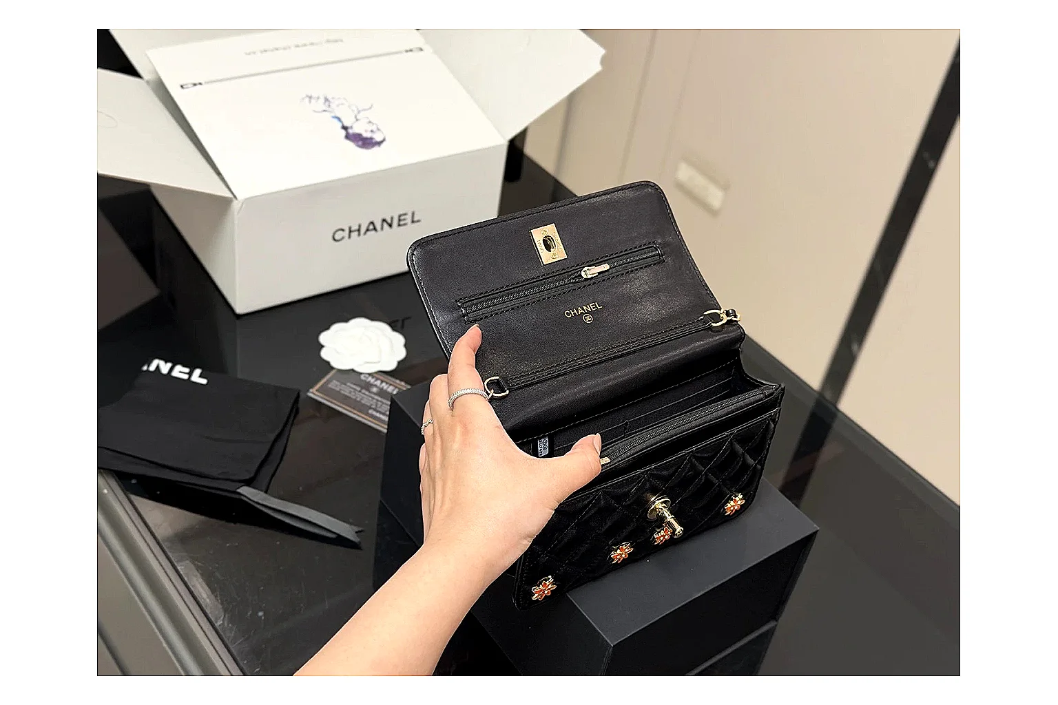 Chanel Quilted Wallet Bag Black Floral spreadsheet record photo showing black quilted wallet-bag body, floral detail, compact flap shape, and polished chain hardware thumbnail 2